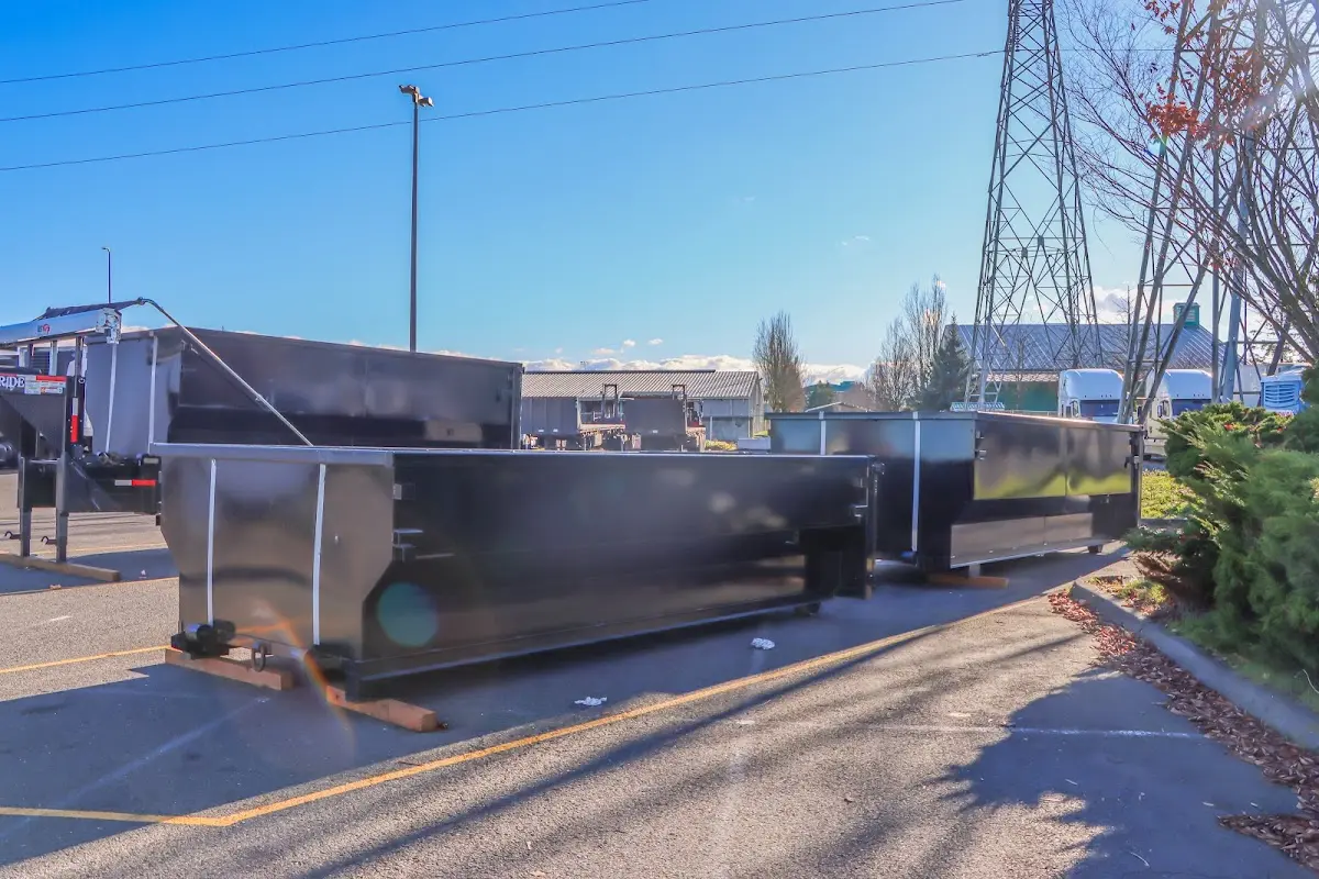Roll-off dumpster ready for waste disposal at job site for Roofing Dumpster Rental in Fairfax